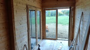 Le Grand Castillon Logement - gîte Intérieur gîte en bois en construction