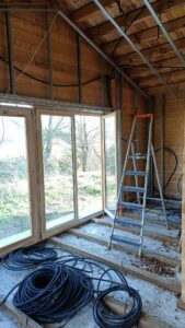 Le Grand Castillon Logement - gîte Intérieur gîte en bois en construction